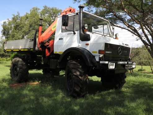 Mercedes Benz Unimog 2150 complete with Palfinger PK9001 crane and dropside body