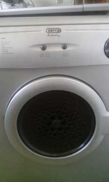 Metallic Defy tumble dryer for sale