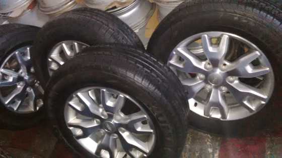 Month end special 4x 18 ford ranger wiltrack magwheels with used tyres about 65 treads r6499