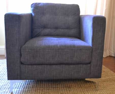 Never been used dark blue occasional chair. Retails for R4999. This is a fabulous and comfy chair. T