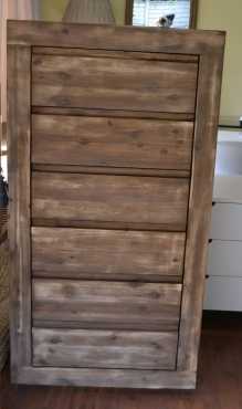 Never been used solid acacia tallboy. Retails for R6999.