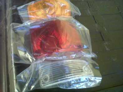 NEW NISSAN 1400 LENSES BOTH SIDES R180