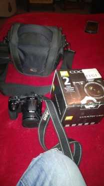 Nikon Coolpix L810 camera and bag for sale