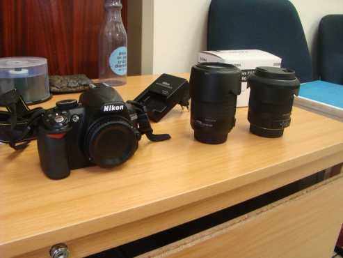 Nikon D3100 with two lenses and carry bag