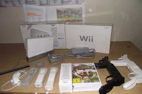 Nintendo Wii with 4 games for sale