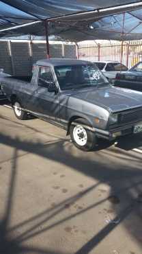 NISSAN 1400 BAKKIE. 2004 MODEL. R44950