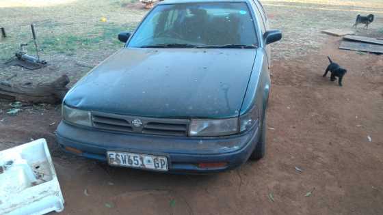 Nissan Maxima 300E automatic amp extra shell on wheels.