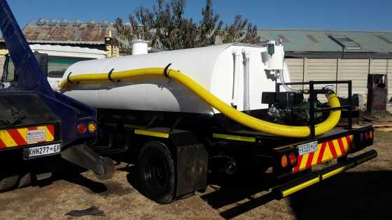 Nissan trucks fitted with BRAND NEW 2500 liter honey sucker system