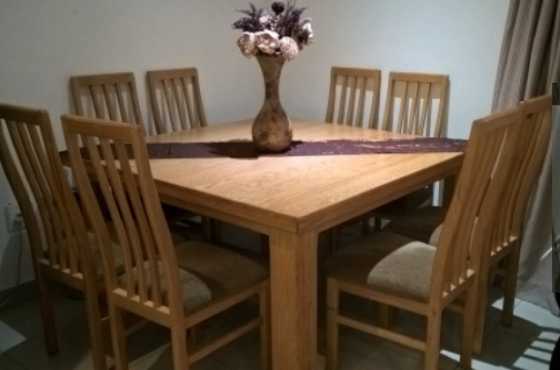 Oak dining table and chairs