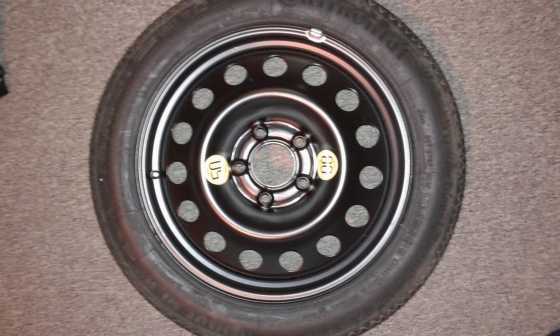 OEM BMW 17 inch space saver spare wheel to swap for home theater