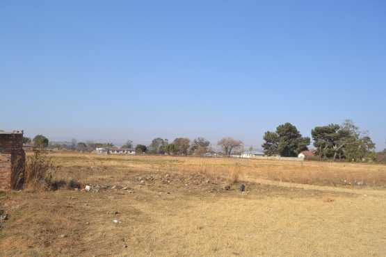 ON TAR ROAD WITH POWER CONNECTION EQUIPPED WORKING BOREHOLE WATER TANKS