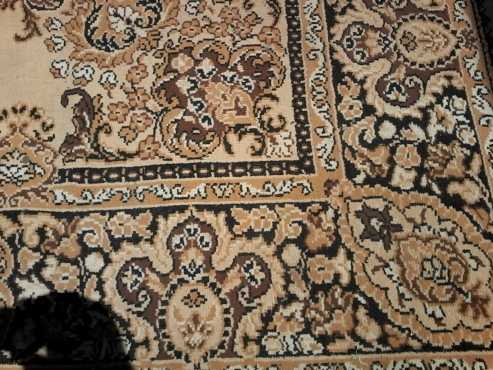 One carpet (brown pattern) for sale