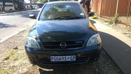 Opel corsa garma 1.6 with low km in awesome condition Aircon, powersteering, airbags, electric windo