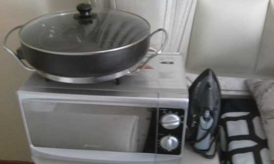 Package of microwave, iron and electric pan