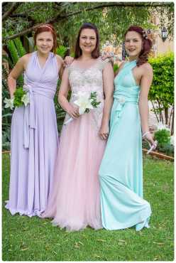 Pink bridal ballgown with bridesmaids dresses