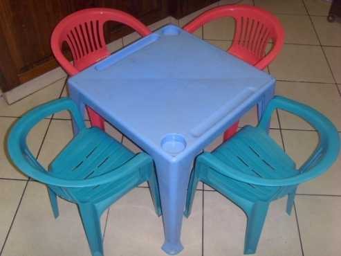 Plastic table and four chairs