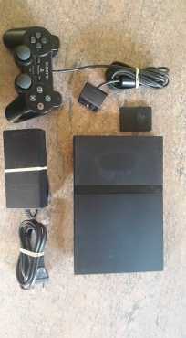 Playstation 2  1 control  5 games  1 8mb memory card