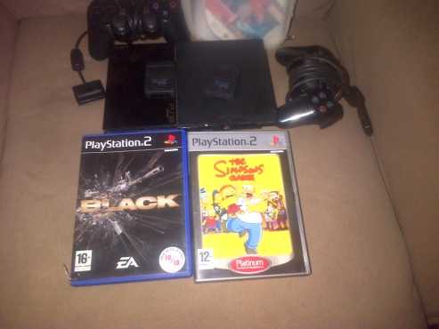 Playstation 2, 2 x remotes , 2 x memory cards with 13 games