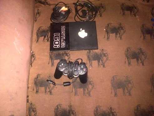 Playstation 2 slim, 1 remote, 3 memory cards and 19 games for sale