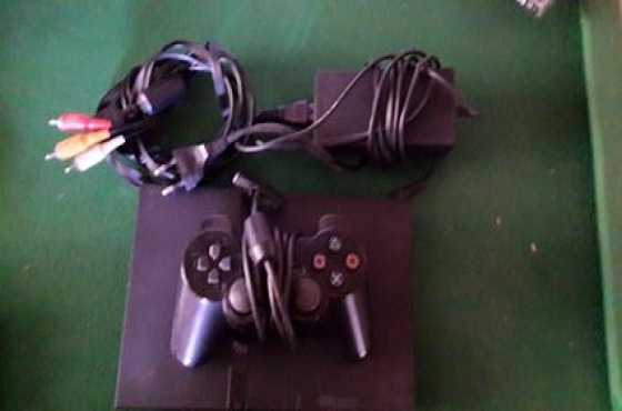 Playstation 2 te koop met games en kabels en remote control ingesluit