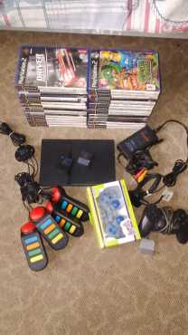 PLAYSTATION 2 WITH BUZZ-BUZZERS