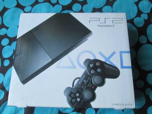 PlayStation 2 with two controller and Games