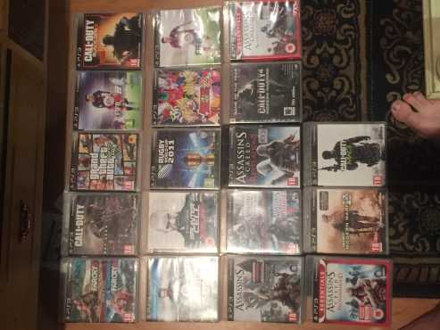 Playstation 3, 2 remotes , 20 games