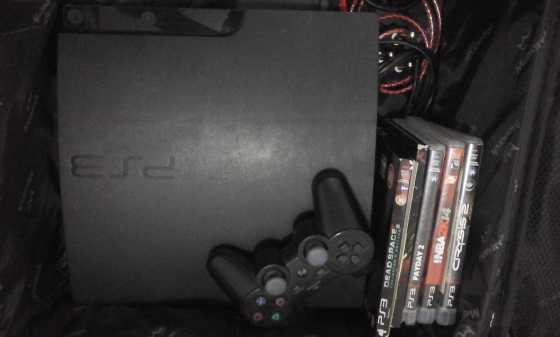 Playstation 3 with 4 games