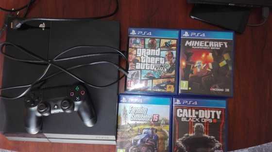 Playstation 4 1TB edition with four games to swop for a 29quot mountain bike