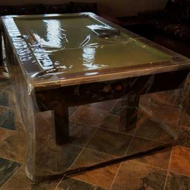 Pool table with cover