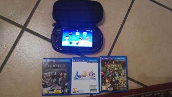 PS Vita and 4 games