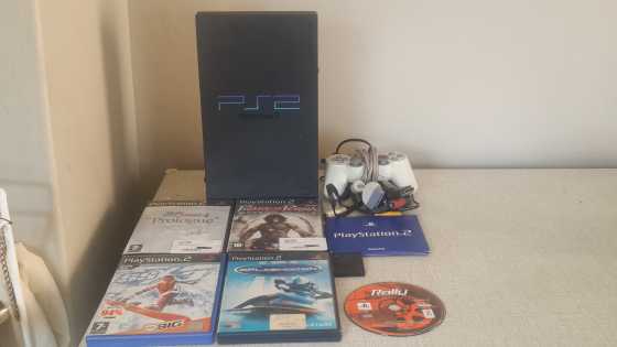 PS2 console 5 games, 1x demo game, 8mb card amp controller