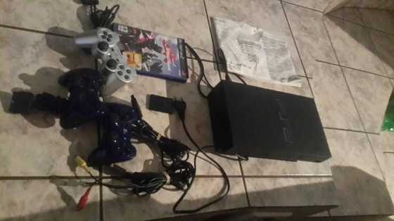 Ps2 met 1 game 3 remotes en memory card