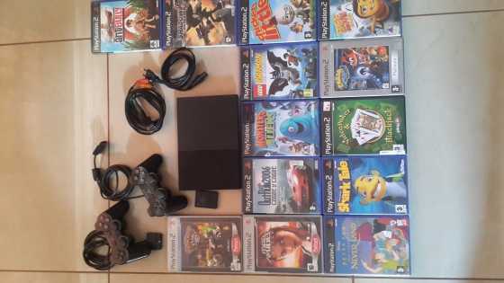 Ps2 slimline, 2 remotes, cables, memory card and 13 games