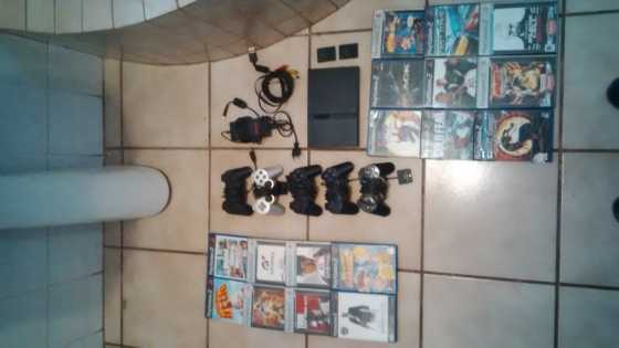 ps2 with 17 games and 5 controllers, 2 memorycards