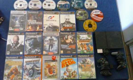 Ps2 with 23 games 2 remotes and 2 memory cards