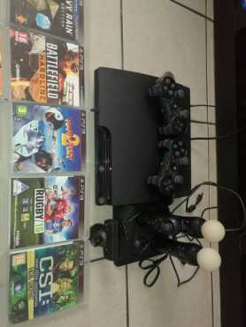 Ps3 Console with 15 games and move extras