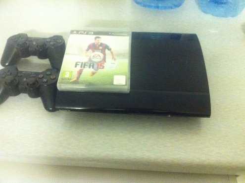 PS3 slim , two controllers and Fifa 15 for sale