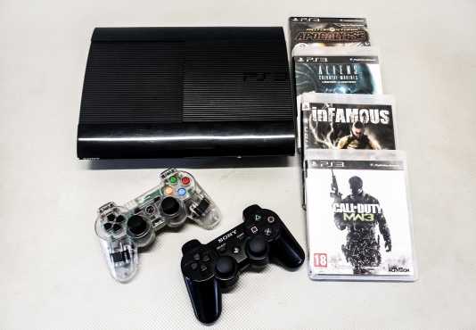 PS3 Super Slim 500GB with controllers and games