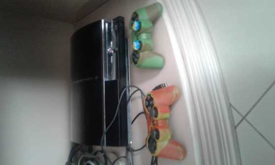 PS3 WITH 4 GAMES