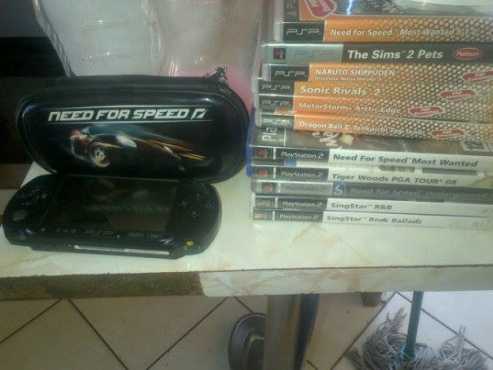 Psp met sy pouch en 7 games tekoop