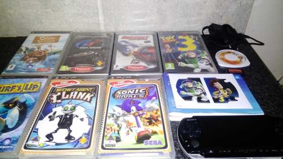 PSP with 8 games and accessories