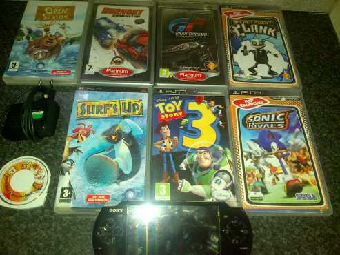 PSP with 8 games and accessories