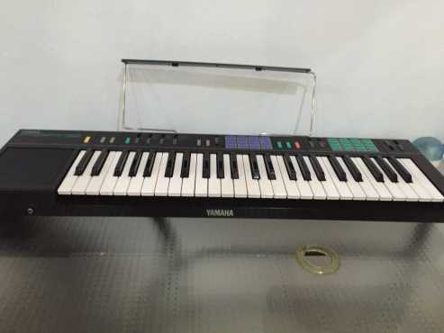 PSR 12 Yamaha Keyboard  Neg