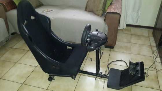 Racing Seat and Logitech Wheel with pedals