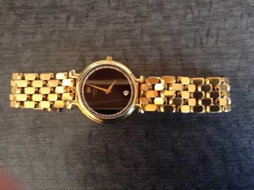 Raymond Weil 18k gold plated with diamonds