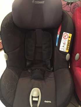 Red and black Maxi Cosi ISO fix car seats