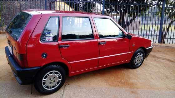 Red Fiat Uno Mia 2002 in EXCELLENT condition