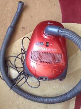 red Lg vacuum cleaner