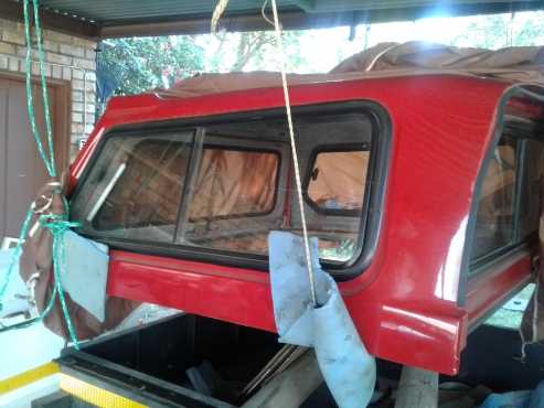 red toyota hilux canopy. 2003 model